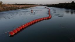 Buoys placed by the state of Texas float on the Rio Grande international boundary between Mexico and the U.S. in Eagle Pass, Texas, on July 21, 2023.
