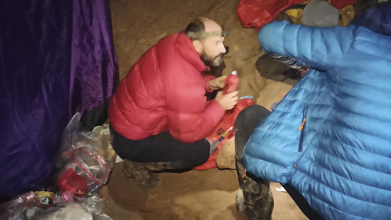 American caver Mark Dickey, left, 40, talks to a colleague inside the Morca cave near Anamur, southern Turkey, on Sept. 7, 2023.
