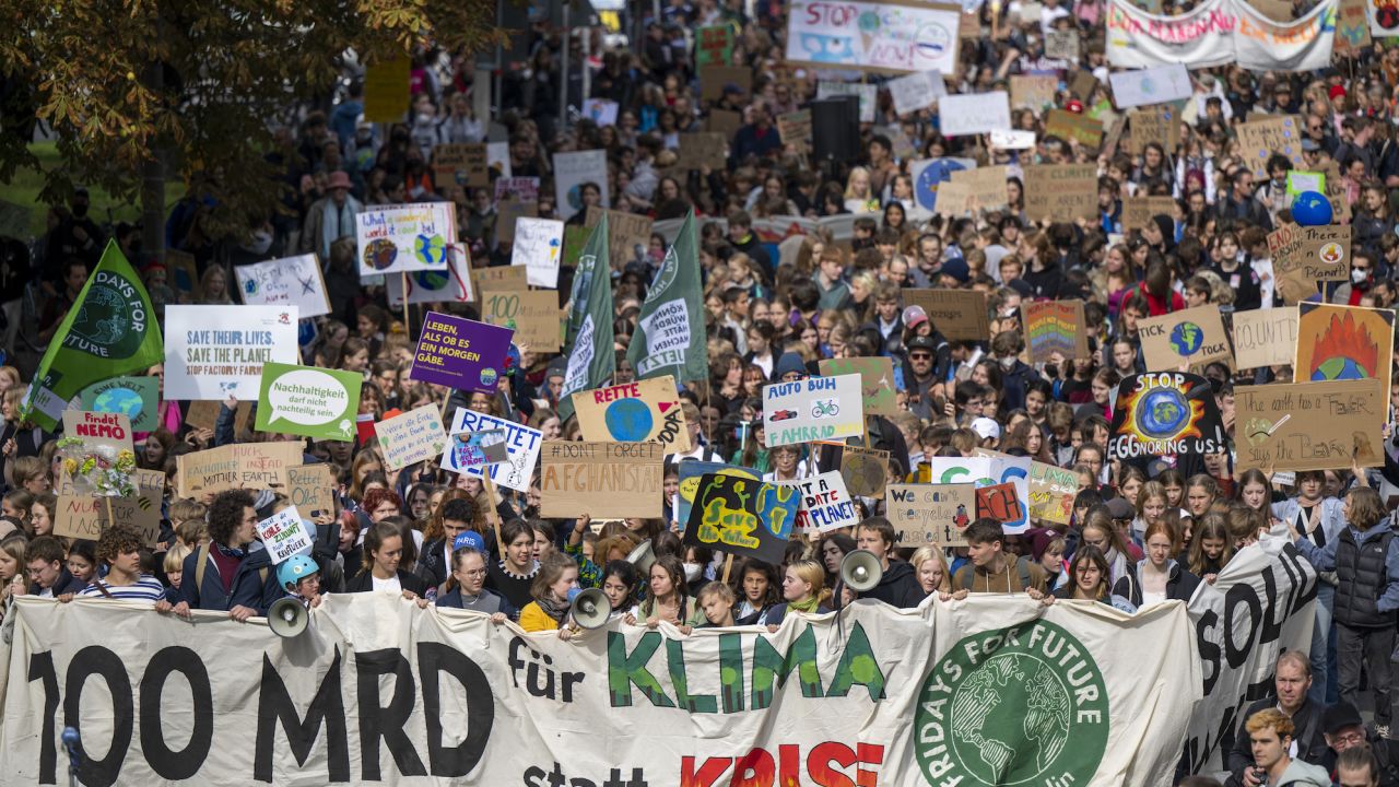 23 September 2022, Berlin: Numerous people parade through the city center with posters and signs demanding action from politicians during the climate strike. The climate protection movement Fridays For Future has called for a worldwide climate strike this Friday. Photo: Monika Skolimowska/dpa (Photo by Monika Skolimowska/picture alliance via Getty Images)