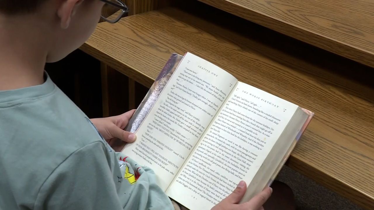 A student reads at a school in Knoxville, Tennessee in May 2023.