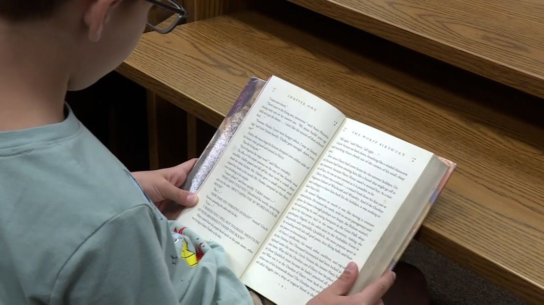 A student reads at a school in Knoxville, Tennessee in May 2023.