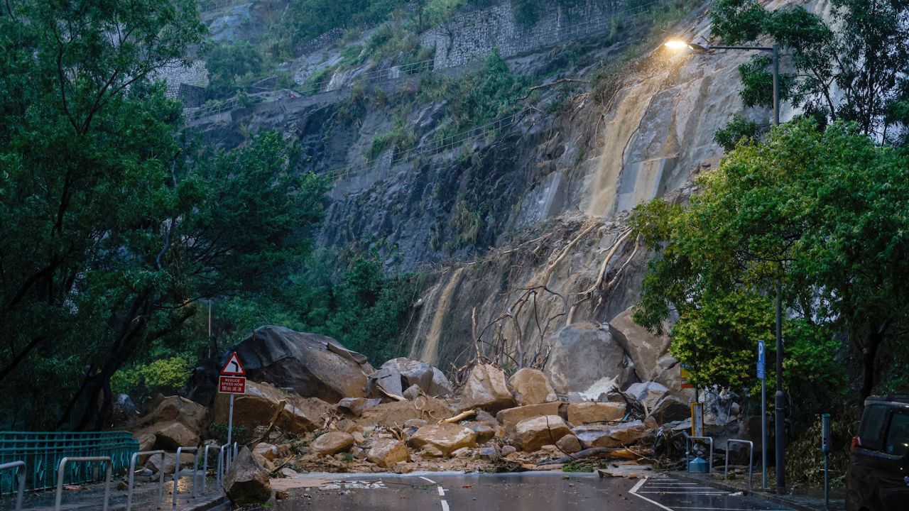 A road blocked due to the debris of a landside after heavy rains, in Hong Ko