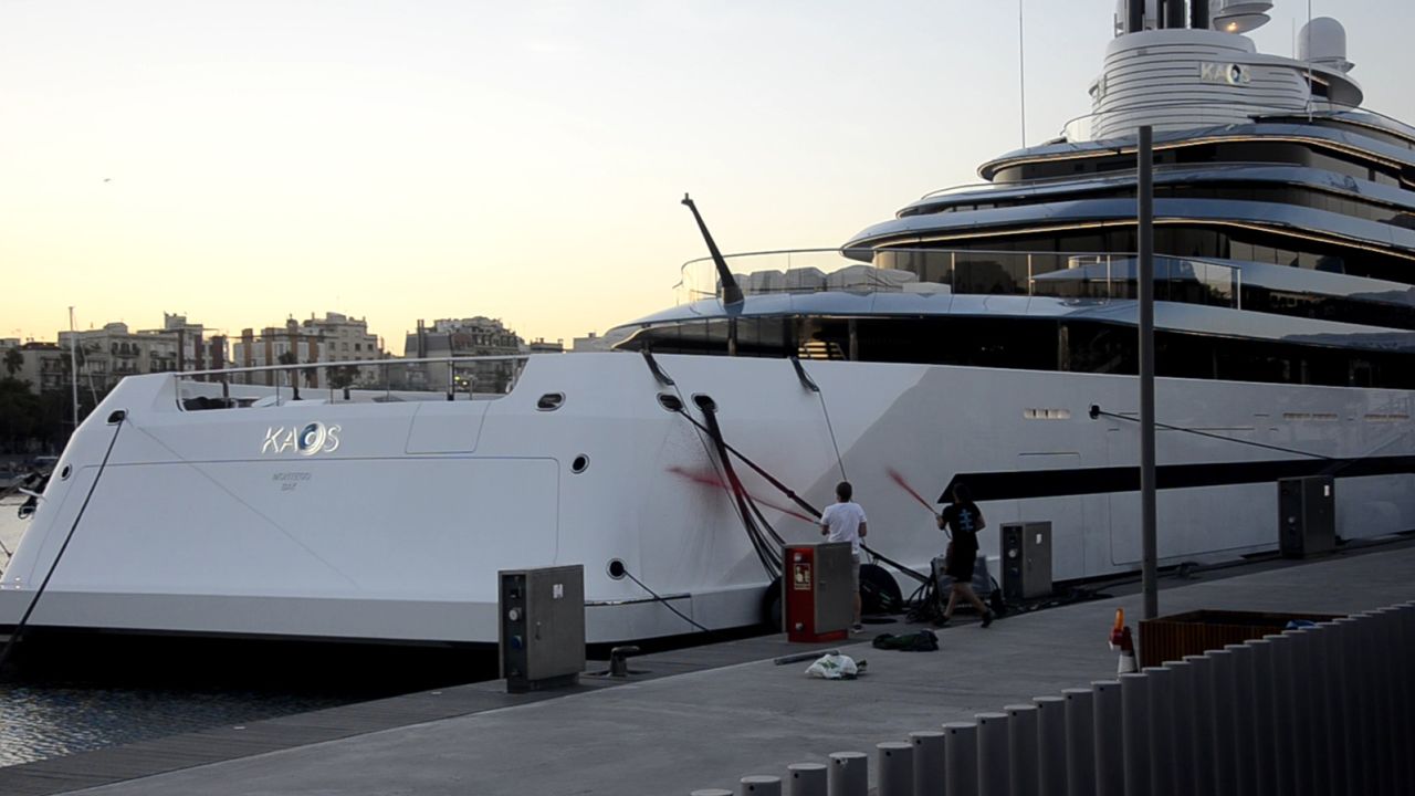 The Walmart heiress Nancy Walton's megayacht was spray painted this morning by climate activists in Marina Port Vell, Barcelona . 