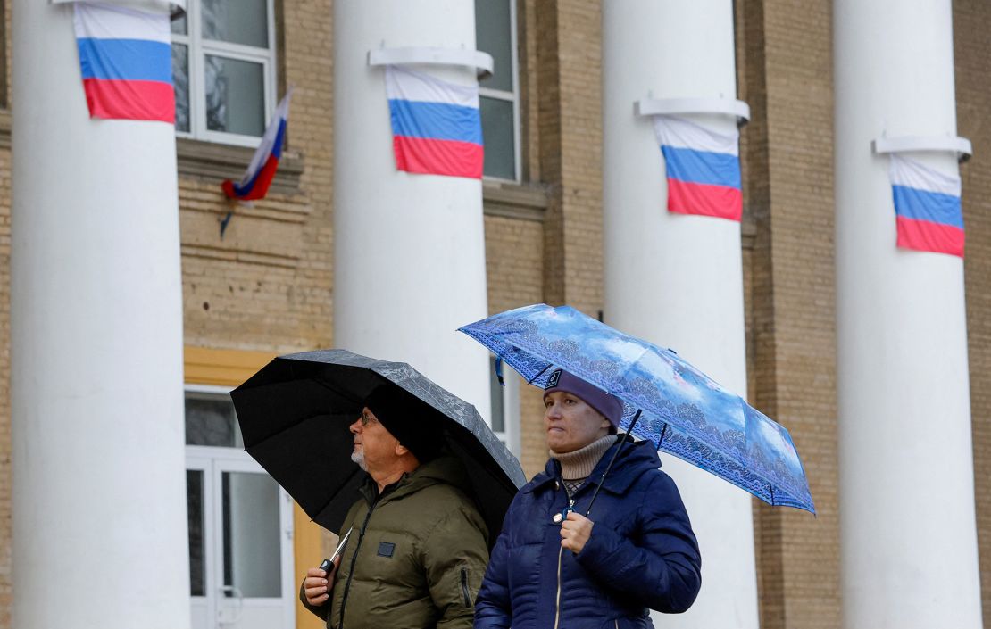 Russian flags hang from public buildings in Melitopol, southern Ukraine. The city was one of the first to be captured by Moscow in the early days of its invasion.