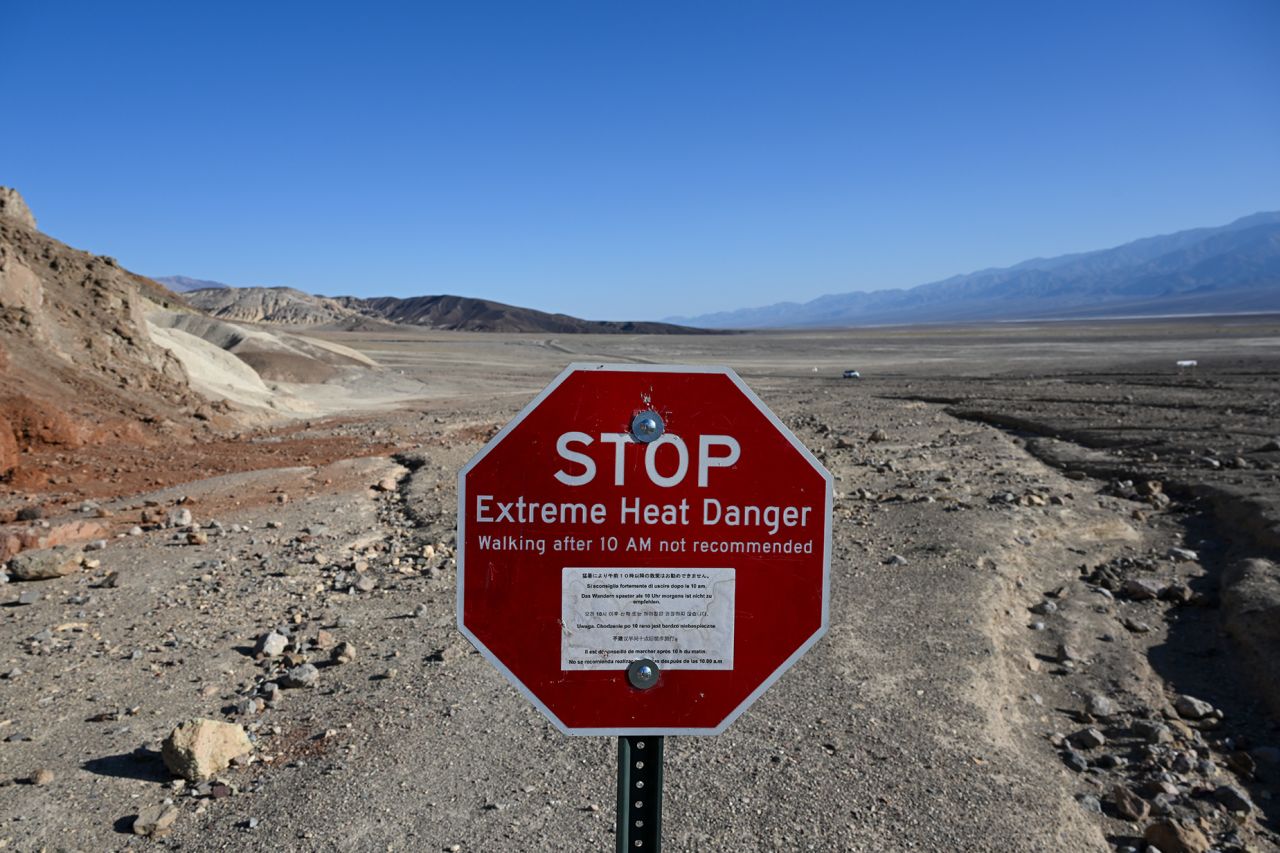 DEATH VALLEY, CALIFORNIA - JULY 9: A sign says 'Extreme Heat Danger' is seen near the Red Canyon trail as 120 Fahrenheit (49 C) is expecting on weekend in Death Valley, California, United States on July 9, 2023. Death Valley, California, widely known as one of the hottest spots on the planet. (Photo by Tayfun Coskun/Anadolu Agency via Getty Images)