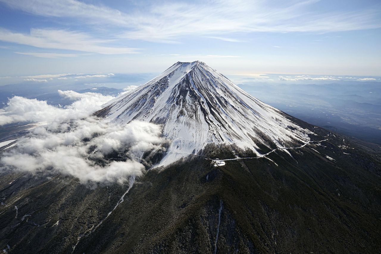 File photo taken Feb. 17, 2023, from a Kyodo News helicopter shows Mt. Fuji, straddling Shizuoka and Yamanashi prefectures, central Japan. (Photo by Kyodo News via Getty Images)
