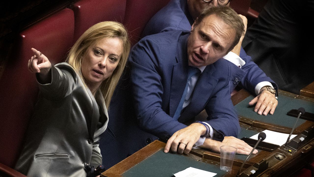 Giorgia Meloni and Francesco Lollobrigida talk during the election of the new President of the Chamber of Deputies, on October 14, 2022 in Rome, Italy. 