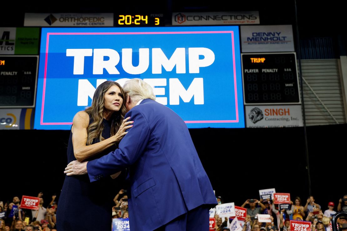 South Dakota Gov. Kristi Noem greets former President and Republican presidential candidate Donald Trump in Rapid City, South Dakota,  September 8.