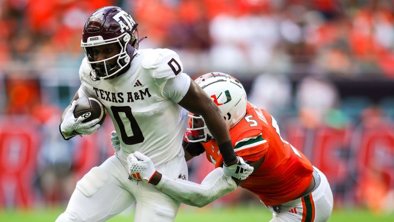 NextImg:Miami Hurricanes safety Kamren Kinchens injured and carted off field during game against Texas A&M | CNN