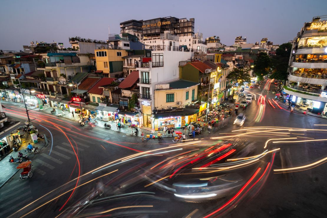 Traffic whizzes through Hanoi's old quarter