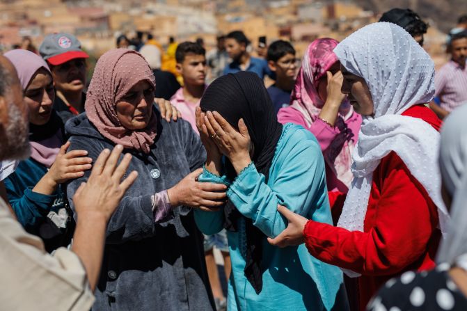 Women mourn in the village of Moulay Brahim on September 10.