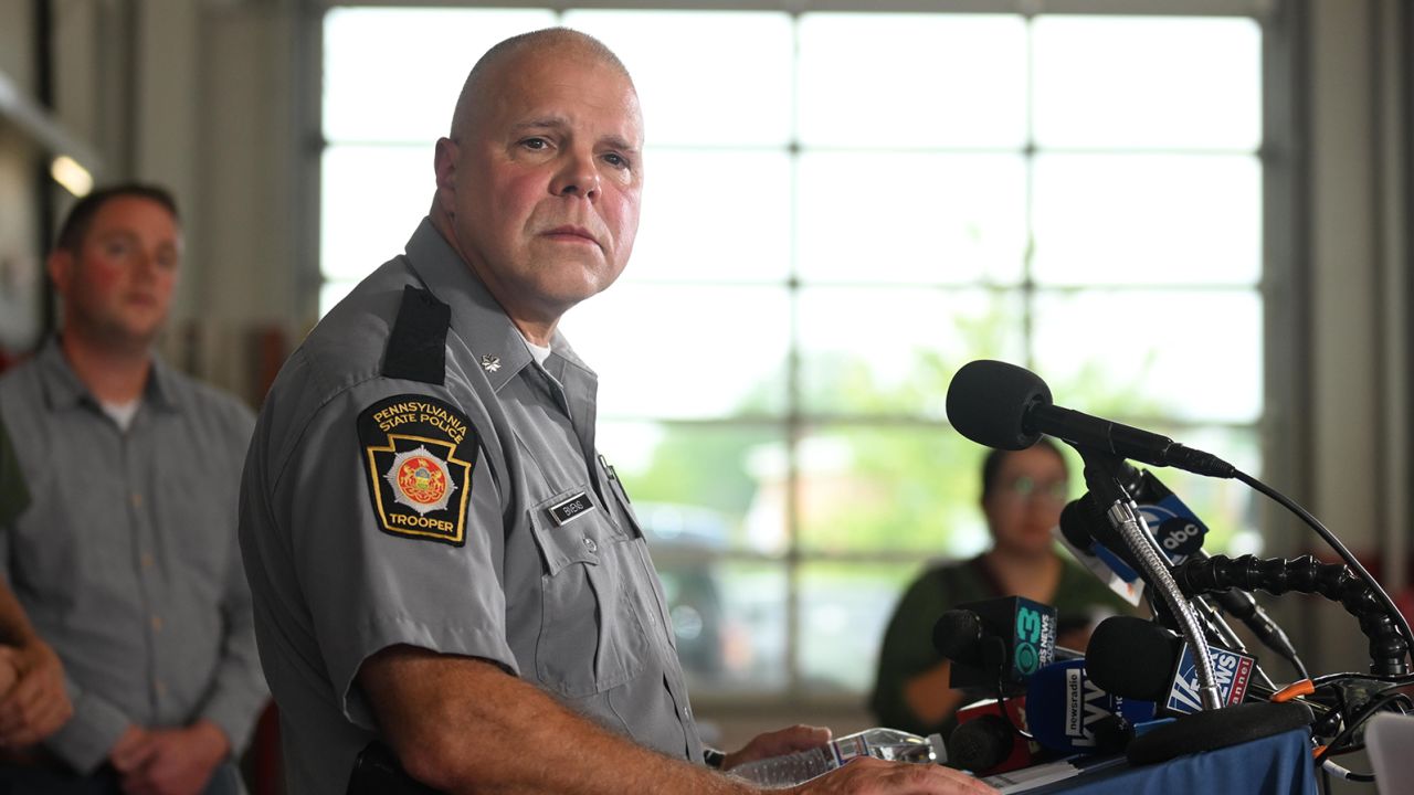 Lt. Col. George Bivens of the Pennsylvania State Police briefs the media on developments in the manhunt for Cavalcante on Sunday.