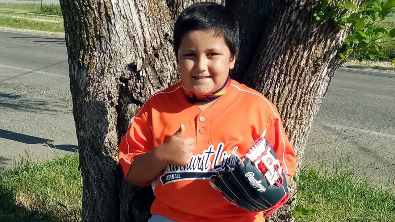 Lori Rosiles says she liked to photograph her children near the same tree at the baseball park. 