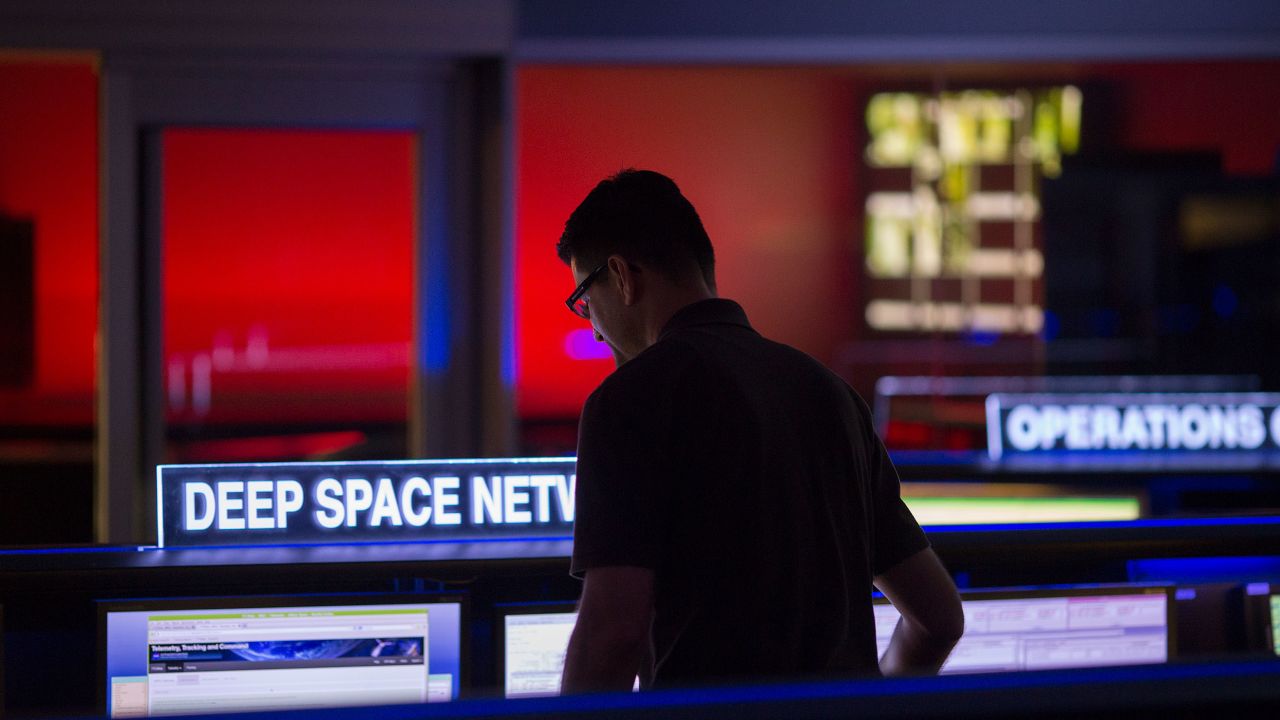 PASADENA, CA - JUNE 30: A scientist works at the Deep Space Network desk in the mission control room of the JPL Space Flight Operations Facility at JPL as NASA officials and the public look forward to the Independence Day arrival of the the Juno spacecraft to Jupiter, at JPL on June 30, 2016 in Pasadena, California. After having traveling nearly 1.8 billion miles over the past five years, the NASA Juno spacecraft will arrival to Jupiter on the Fourth of July to go enter orbit and gather data to study the enigmas beneath the cloud tops of Jupiter. The risky $1.1 billion mission will fail if it does not enter orbit on the first try and overshoots the planet.  (Photo by David McNew/Getty Images)