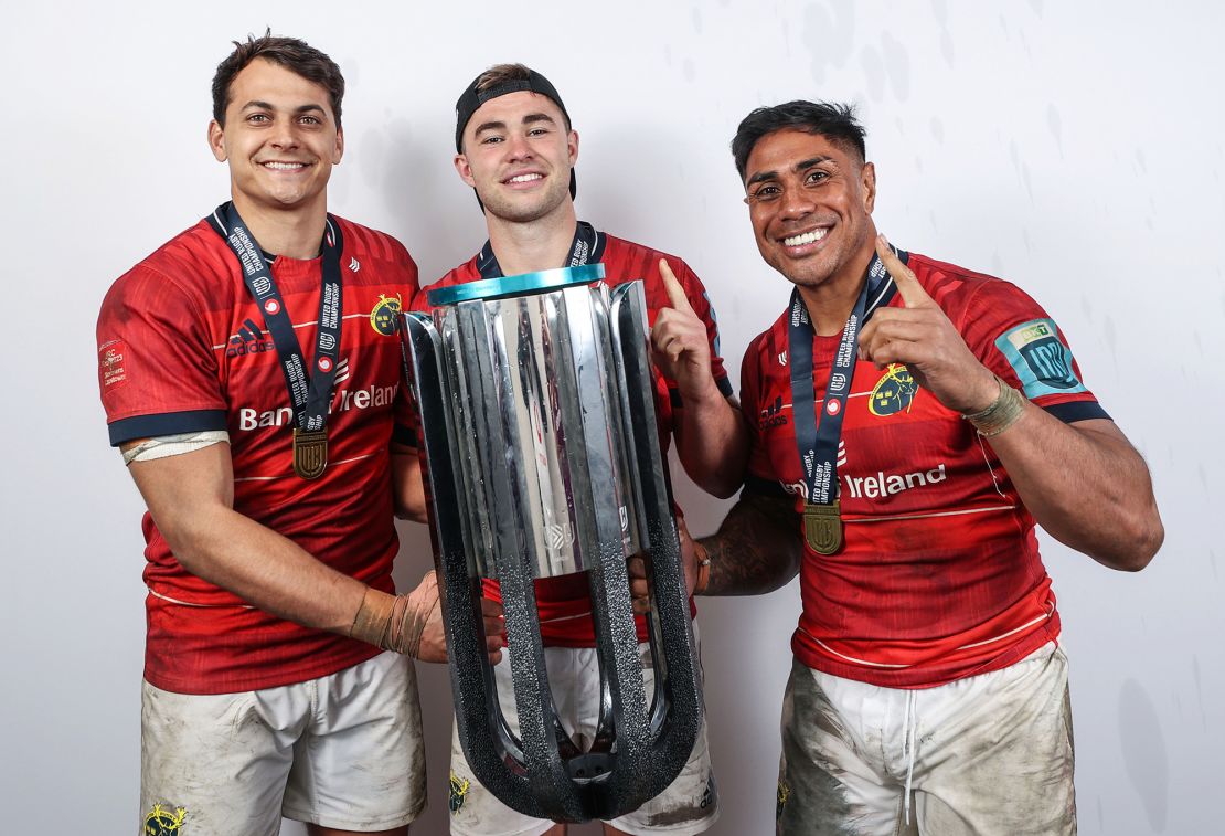 Mandatory Credit: Photo by James Crombie/INPHO/Shutterstock (13935734ek)
DHL Stormers vs Munster. Munster's Antoine Frisch, Jack Crowley and Malakai Fekitoa celebrates with the URC Trophy
BKT United Rugby Championship Final, DHL Stadium, Cape Town, South Africa - 27 May 2023