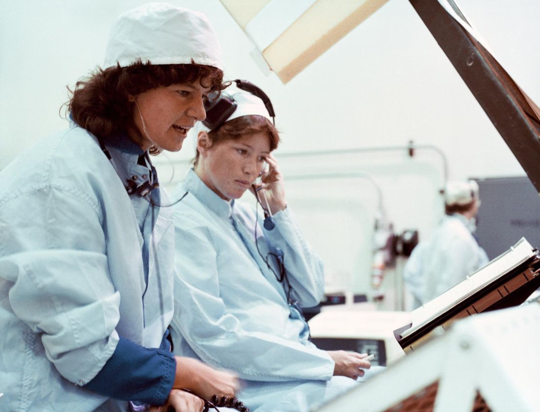 S83-32822 (5 May 1983) --- Astronaut Sally K. Ride (left) participates in a mission sequence test in preparation for STS-7, in the Kennedy Space Center?s (KSC) vertical processing facility (VPF). Dr. Ride is a mission specialist for the flight. She is joined here by Anna L. Fisher, a physician and astronaut from the 1978 group of 35, which also included Dr. Ride. Photo credit: NASA
Date Created:1983-05-26