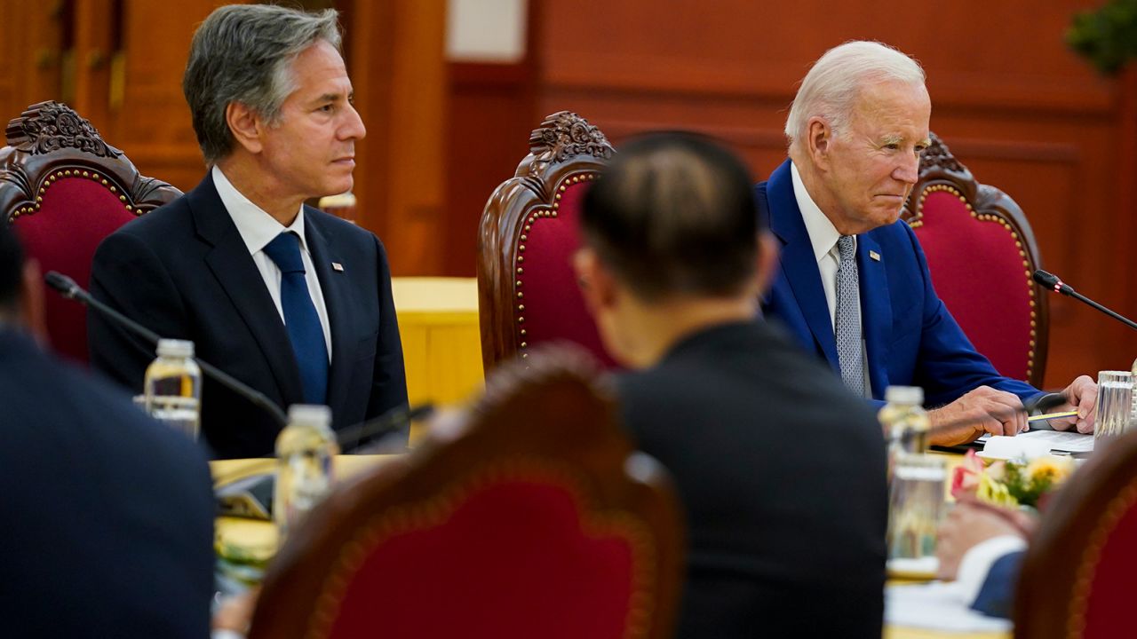 President Biden, right, and US Secretary of State Antony Blinken, left, meeting with Vietnam's General Secretary Nguyen Phu Trong at the Communist Party of Vietnam Headquarters, in Hanoi on Sunday