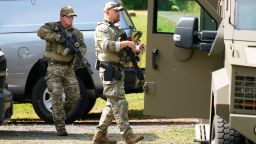 Law enforcement officers gather as they search for escaped convict Danelo Cavalcante in Glenmoore, Pennsylvania, on Monday.