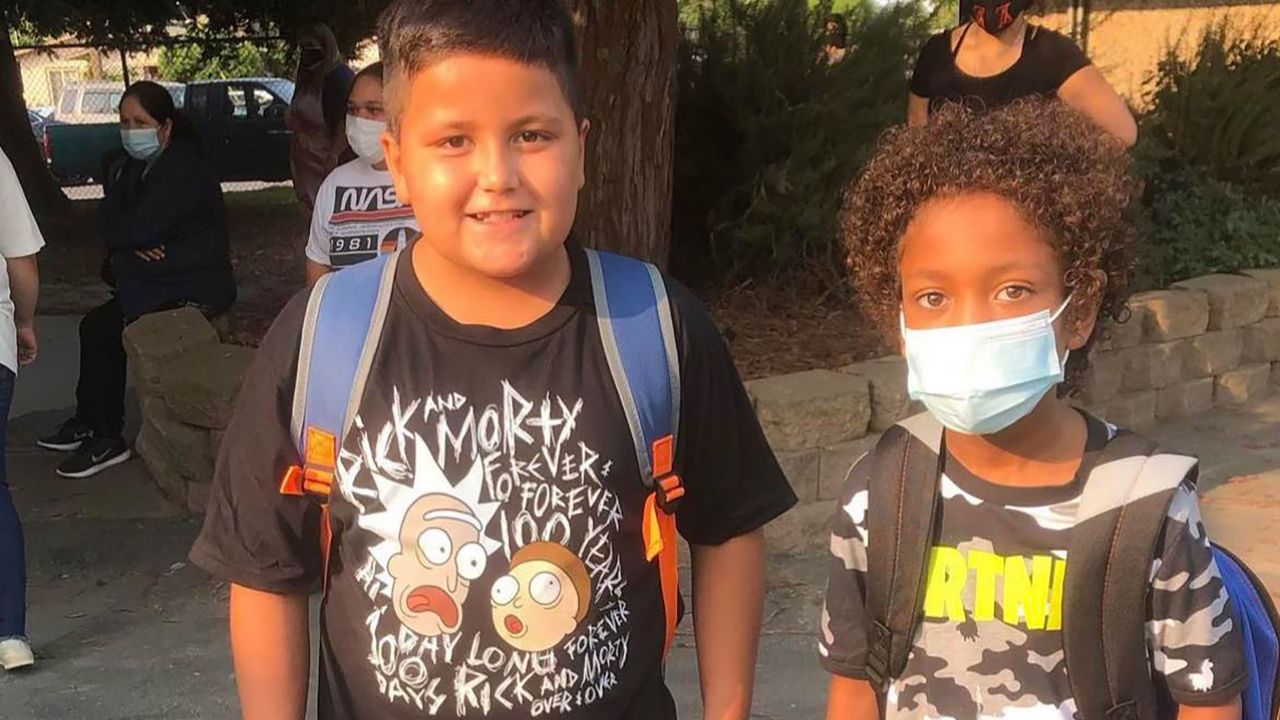 Frankie Rosiles, left, and Trevon Alfred, are seen here with their backpacks in an undated picture. Trevon says he thinks of his best friend every day.