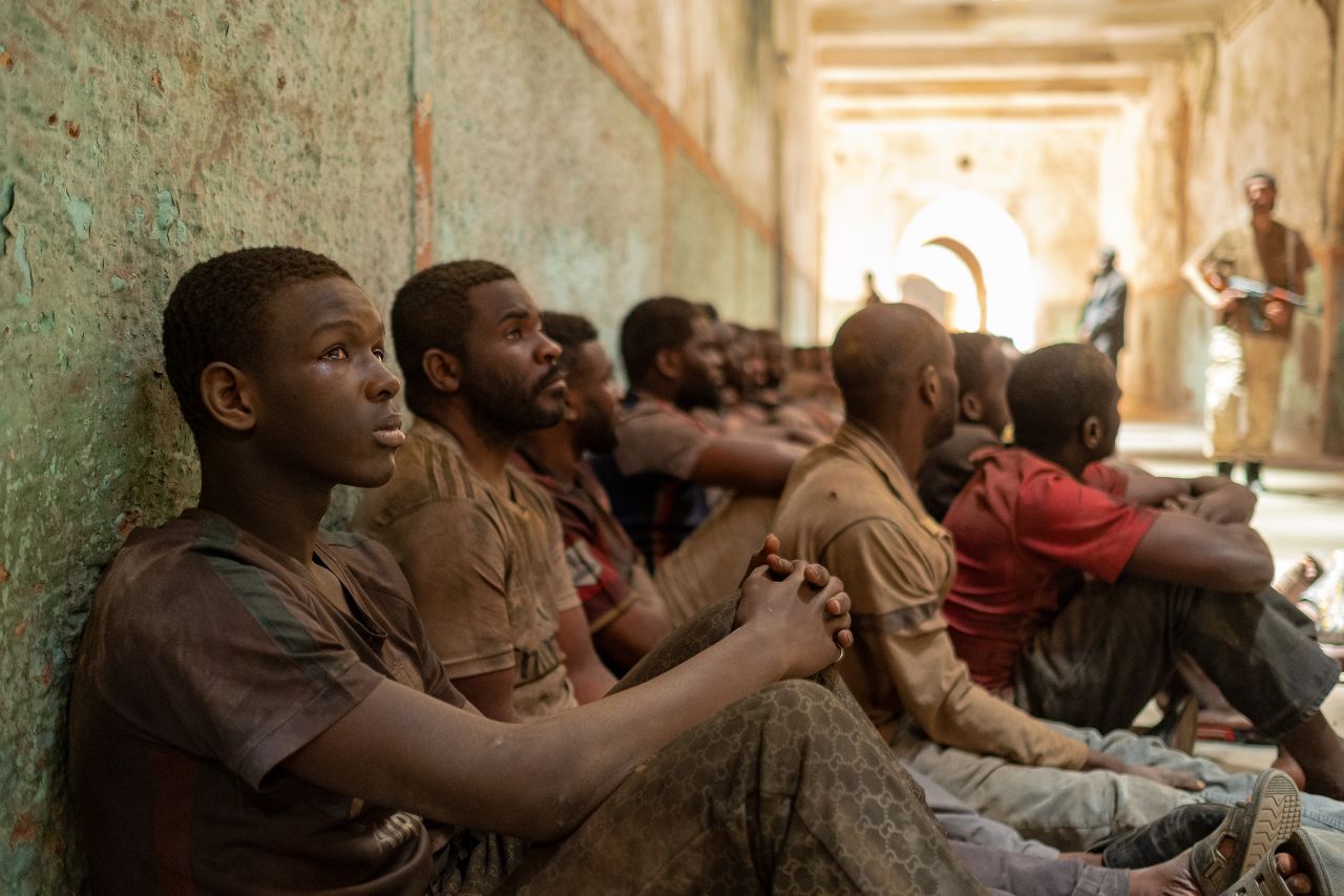 "Io Capitano" does not shy away from showing audiences the dangers faced by its two protagonists on their journey, including a period of imprisonment Seydou experiences in Libya.