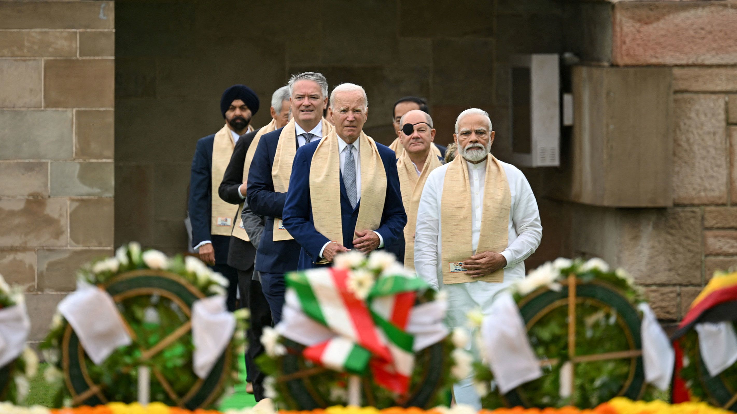 President Joe Biden visits Raj Ghat memorial with Prime Minister of India Narendra Modi and other G20 leaders, Sept. 10, 2023, in New Delhi.