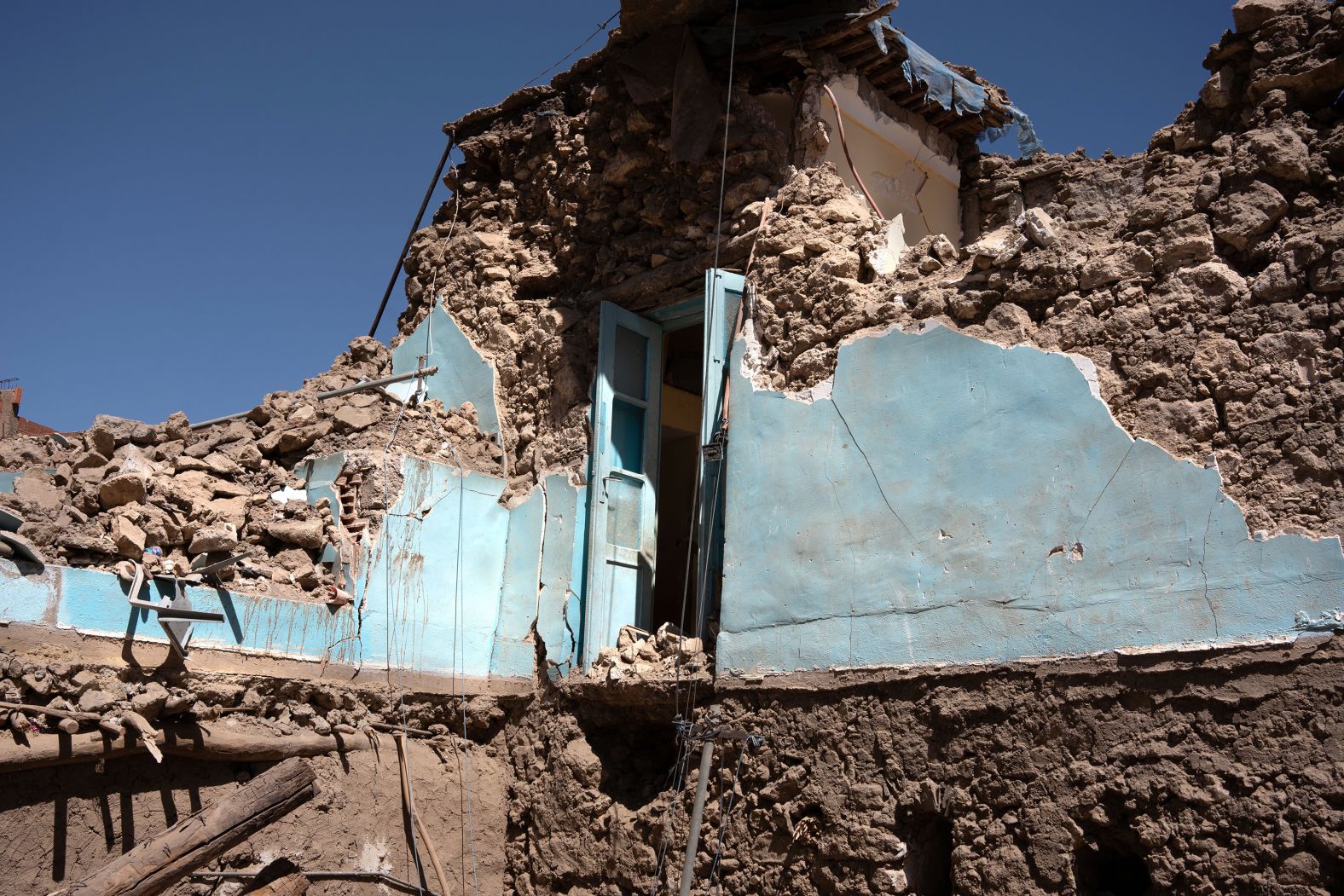 Asoki's house was leveled by Friday night's 6.8 magnitude earthquake. None of the houses in Moulay Brahim are habitable.