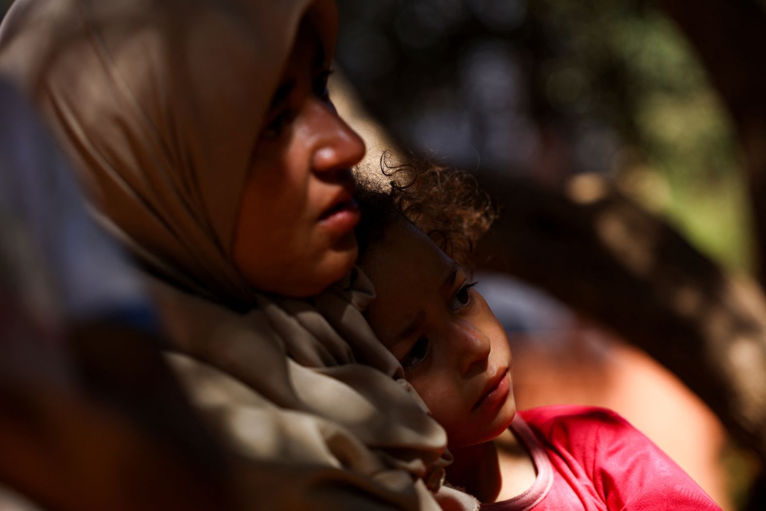 A woman and a child rest in Tinmel, Morocco, on September 11.