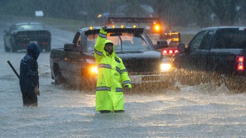 Vehicles make their way through a flooded Lancaster Street during heavy rain in Leominster, Mass., Monday, Sept. 11, 2023. (Rick Cinclair/Worcester Telegram & Gazette via AP)