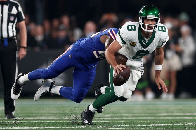 Quarterback Aaron Rodgers, making his debut with the New York Jets, is sacked by Buffalo Bills defensive end Leonard Floyd on Monday, September 11. Rodgers <a href="https://www.cnn.com/2023/09/11/sport/nfl-aaron-rodgers-injury-spt-intl/index.html" target="_blank">suffered an ankle injury</a> and was carted off the field after the play, which occurred during the team's first drive in the first quarter. Before being traded in the offseason, Rodgers had spent the first 18 seasons of his NFL career with the Green Bay Packers.