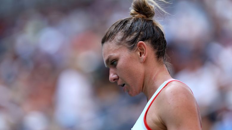 NEW YORK, NEW YORK - AUGUST 29: Simona Halep of Romania looks on against Daria Snigur of Ukraine during the Women's Singles First Round on Day One of the 2022 US Open at USTA Billie Jean King National Tennis Center on August 29, 2022 in the Flushing neighborhood of the Queens borough of New York City. (Photo by Julian Finney/Getty Images)