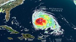  Ураганът Лий се вихри в Атлантическия океан във вторник, 12 септември. class=