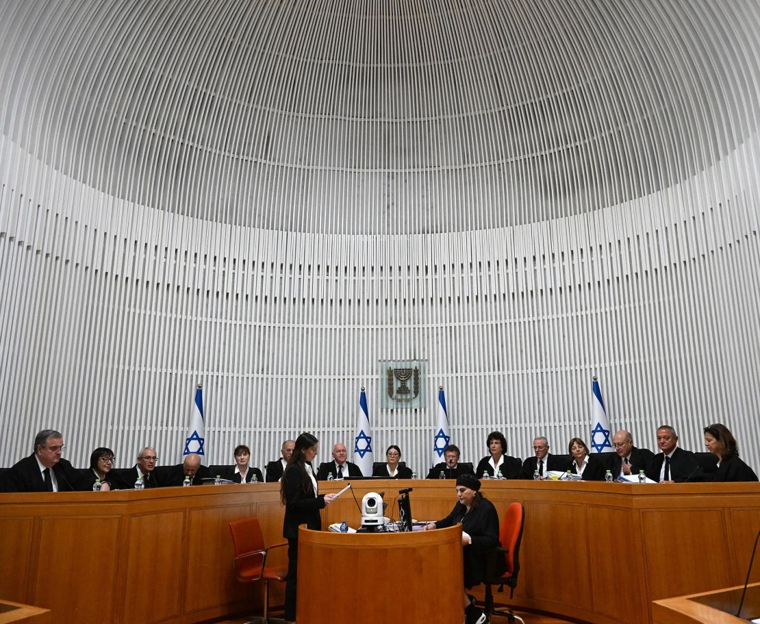 All 15 judges of the Israeli Supreme Court assembled for the start of hearings on Tuesday.