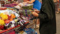 COLCHESTER, VERMONT - SEPTEMBER 6: A person goes through a note pad while shopping for items at a Costco Wholesale store on September 6, 2023 in Colchester, Vermont. (Photo by Robert Nickelsberg/Getty Images)