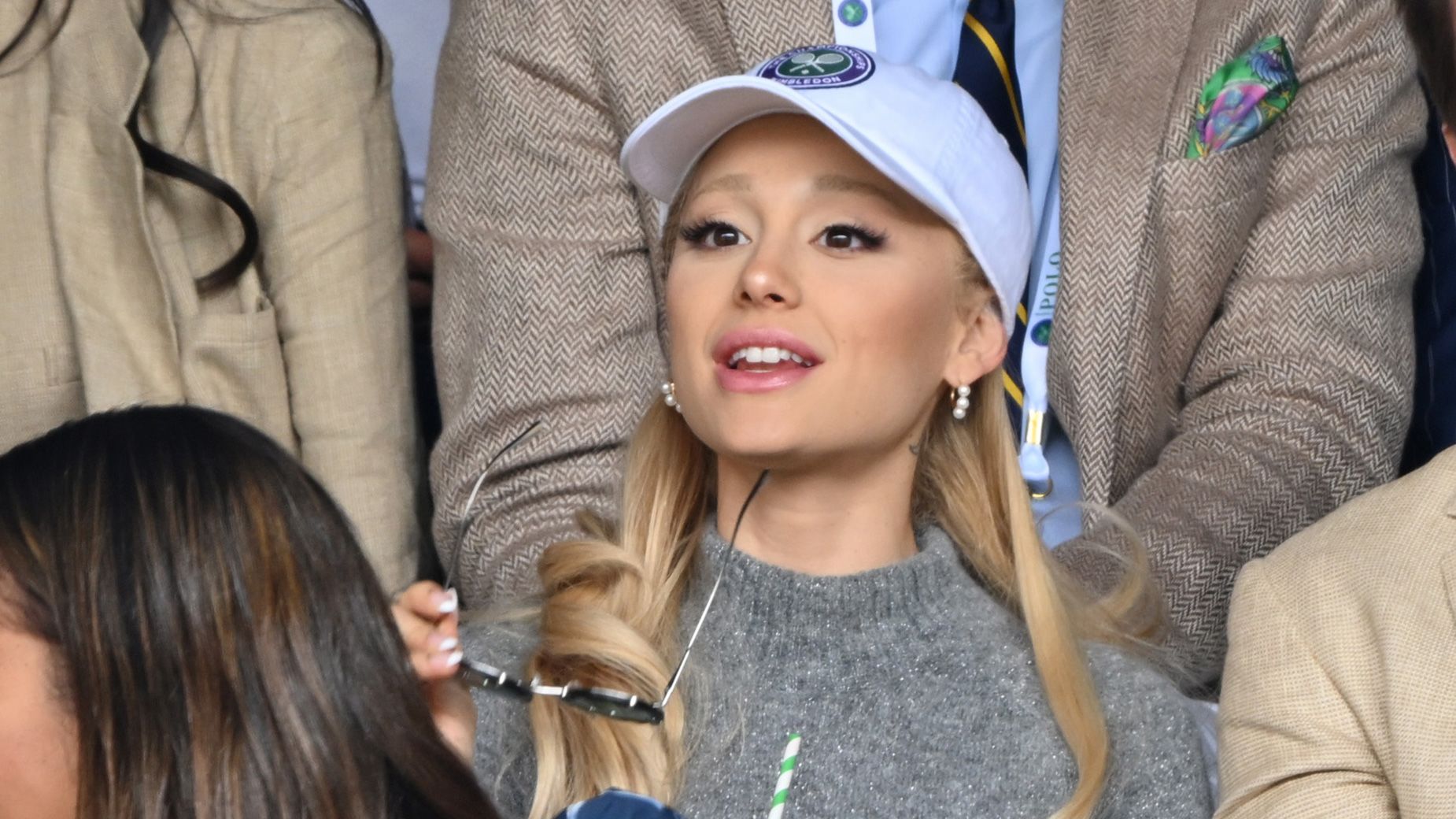 LONDON, ENGLAND - JULY 16: Jonathan Bailey, Ariana Grande, Andrew Garfield and Tom Hiddleston watch Carlos Alcaraz vs Novak Djokovic in the Wimbledon 2023 men's final on Centre Court during day fourteen of the Wimbledon Tennis Championships at the All England Lawn Tennis and Croquet Club on July 16, 2023 in London, England. (Photo by Karwai Tang/WireImage)