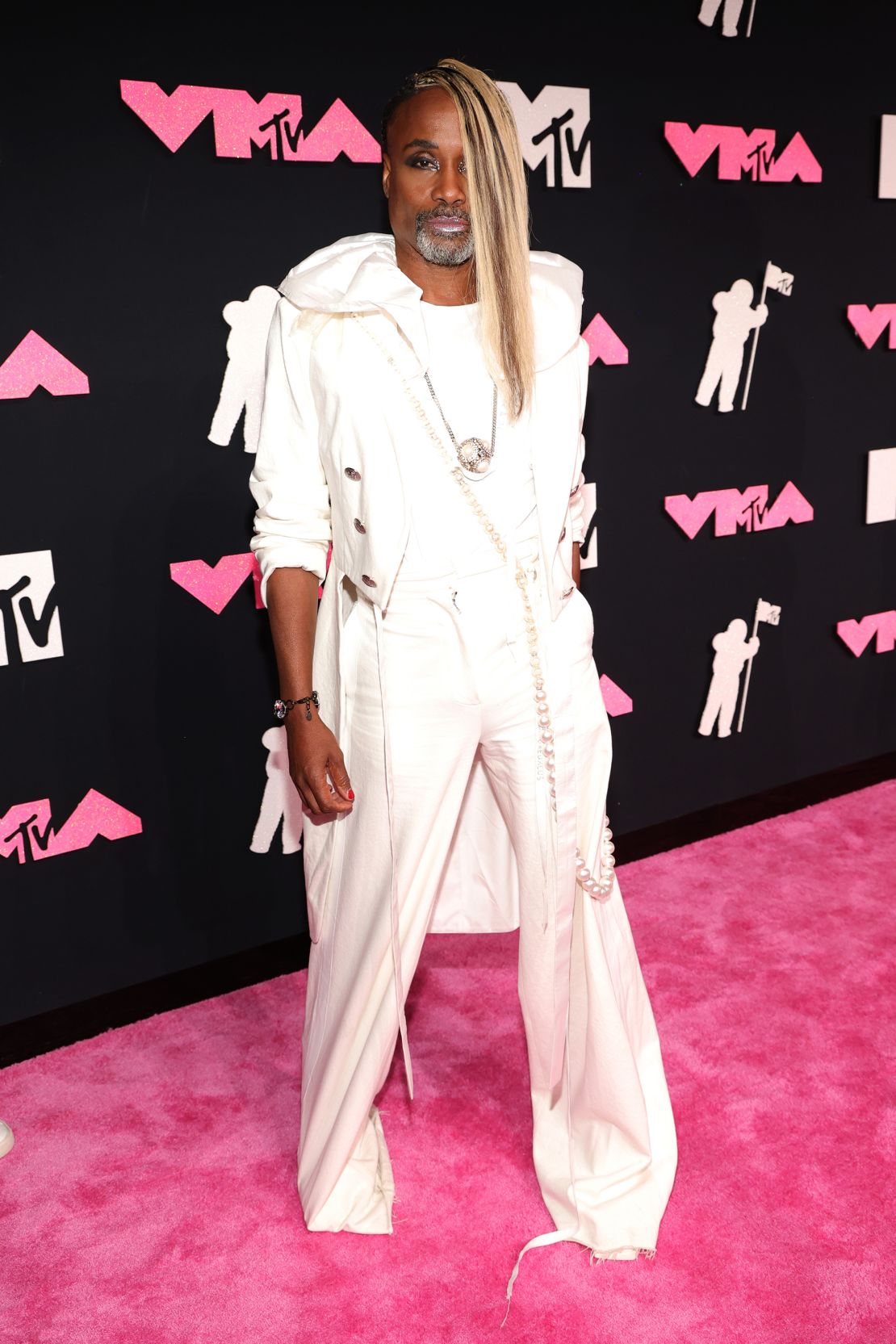 Billy Porter sported a long, blond-streaked ponytail as a side fringe to cap off his striking all-white look. 
