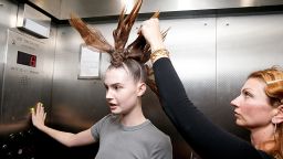 NEW YORK, NEW YORK - SEPTEMBER 11: A model prepares backstage at the Shao show during New York Fashion Week - September 2023: The Shows on September 11, 2023 in New York City. (Photo by Dominik Bindl/Getty Images)