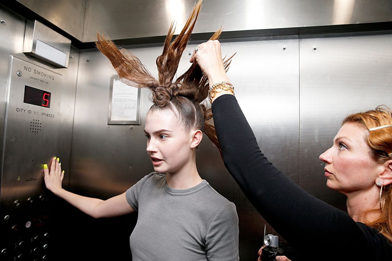 NEW YORK, NEW YORK - SEPTEMBER 11: A model prepares backstage at the Shao show during New York Fashion Week - September 2023: The Shows on September 11, 2023 in New York City. (Photo by Dominik Bindl/Getty Images)