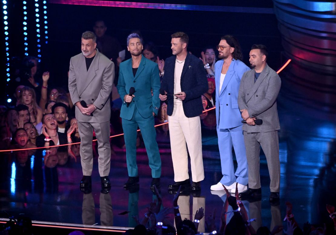 NEWARK, NEW JERSEY - SEPTEMBER 12: (L-R) Joey Fatone, Lance Bass, Justin Timberlake, JC Chasez and Chris Kirkpatrick of NSYNC speak onstage during the 2023 MTV Video Music Awards at Prudential Center on September 12, 2023 in Newark, New Jersey. (Photo by Noam Galai/Getty Images for MTV)