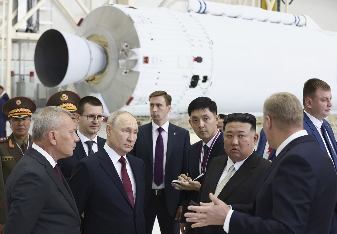 Putin and Kim Jong Un examine a rocket assembly hangar during their meeting at the Vostochny cosmodrome.