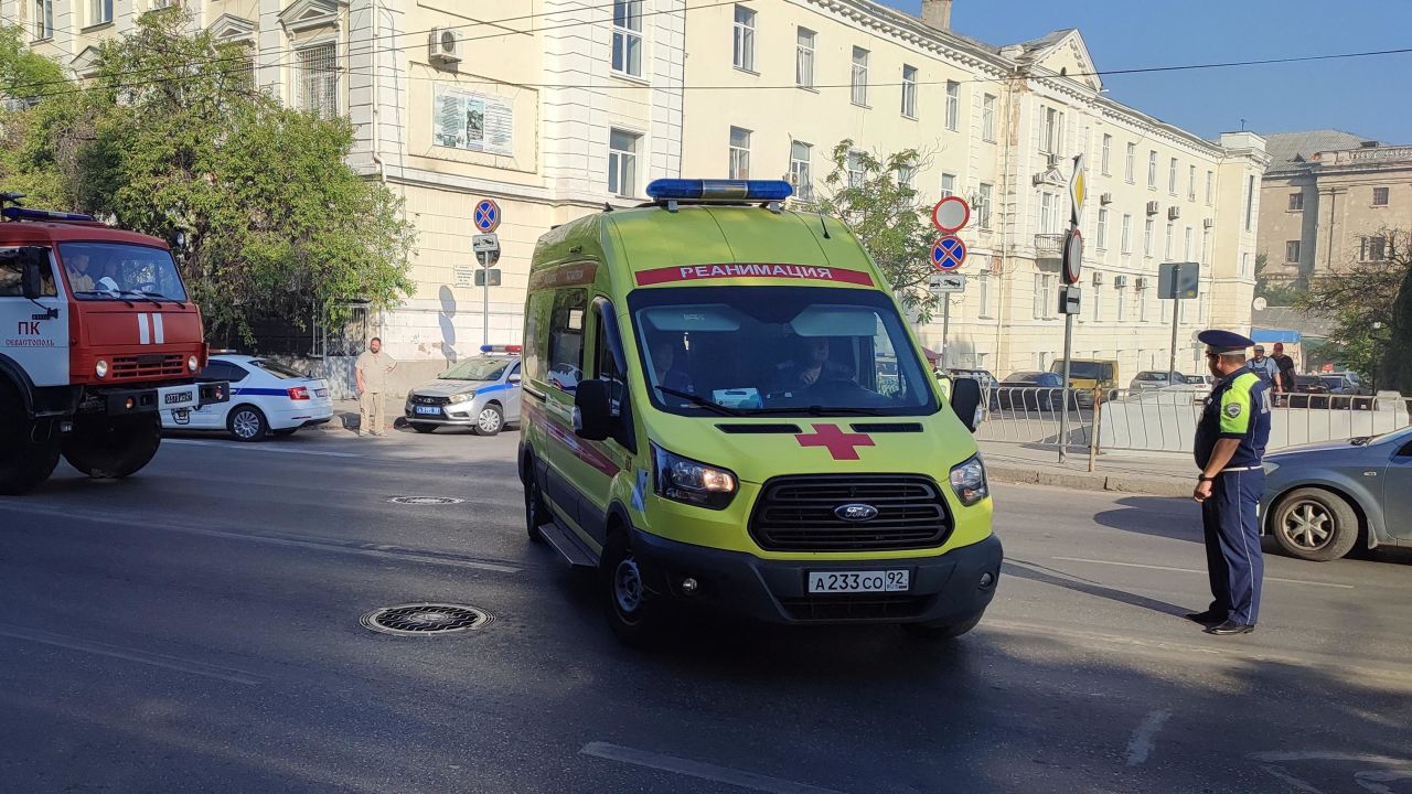 An ambulance leaves the area next to the shipyard in Sevastopol, Crimea, on September 13, 2023.