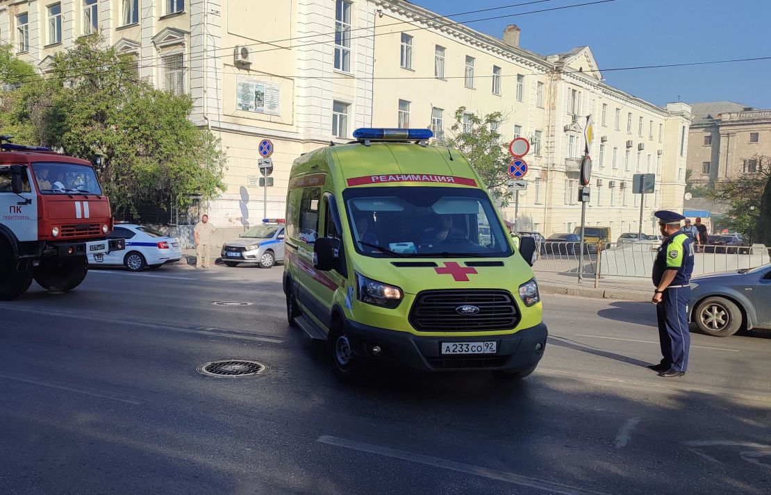 An ambulance leaves the area next to the shipyard in Sevastopol, Crimea, on September 13, 2023.