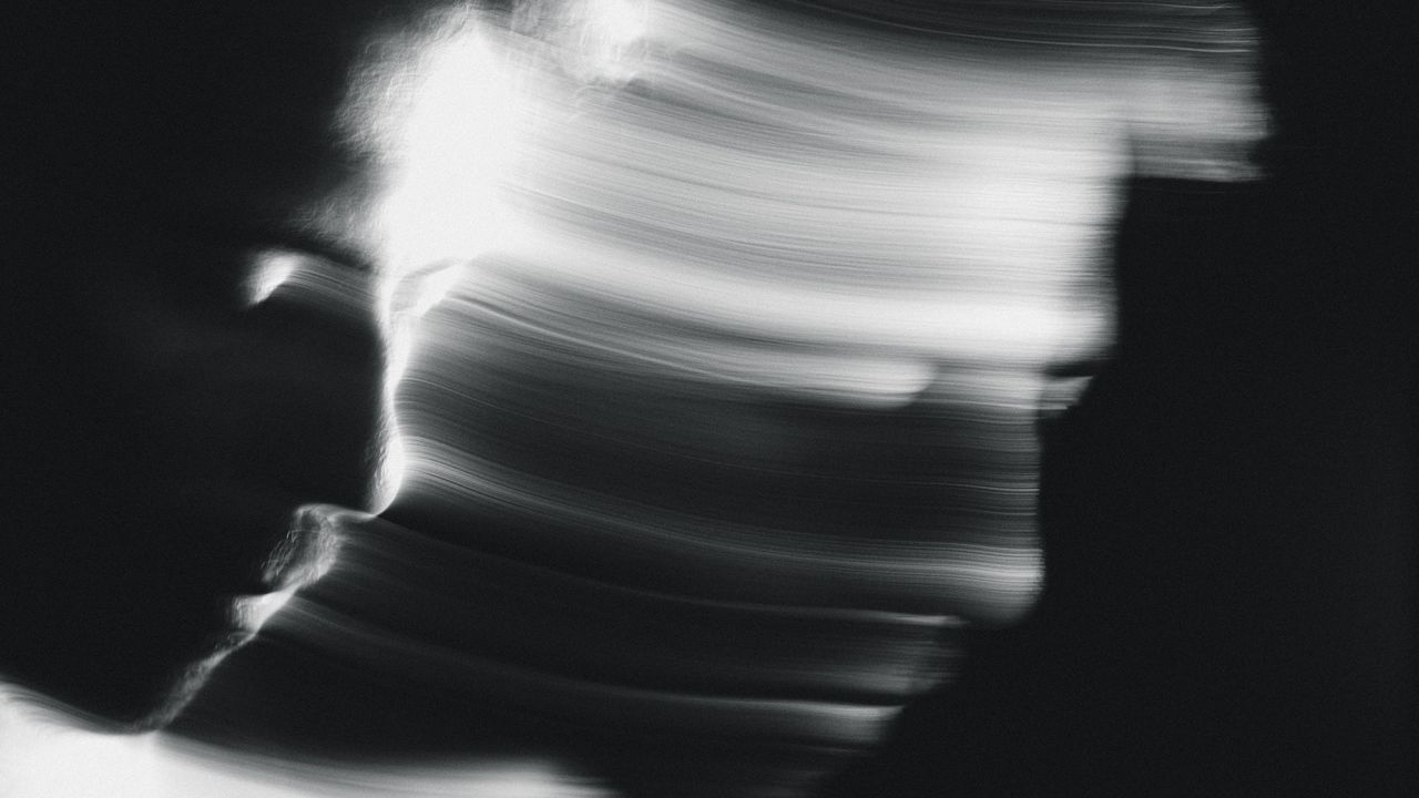 Portrait of men long exposure black and white