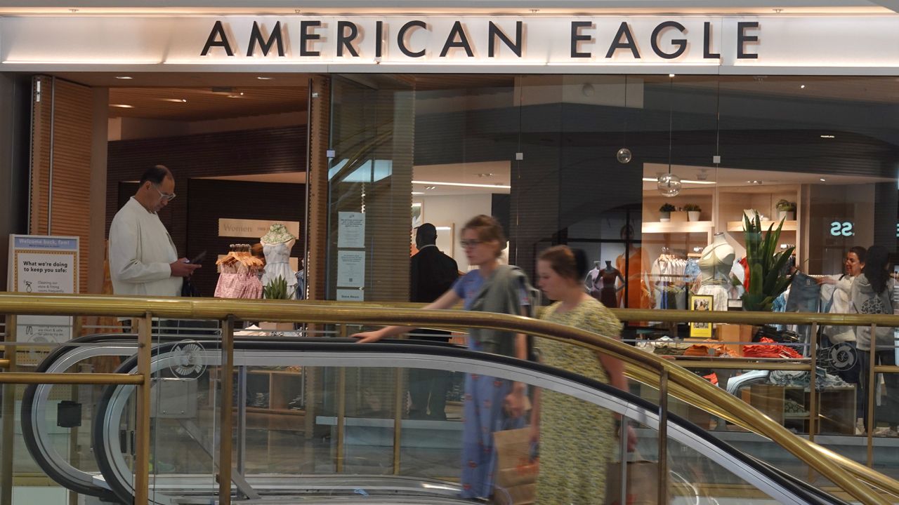 Shoppers ride an escalator at the Westfield San Francisco Centre on April 13, 2022 in San Francisco, California. 