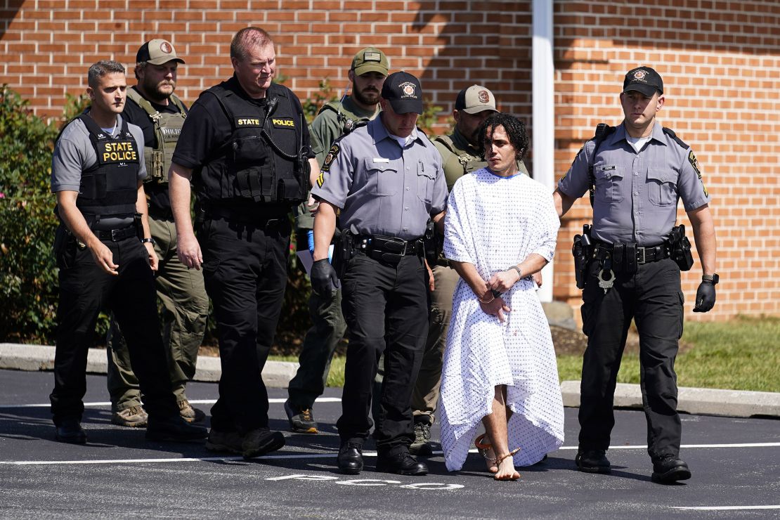 Law enforcement officers escorted Danilo Cavalcante from a Pennsylvania State Police barracks in Avondale, Pennsylvania, on Wednesday, September 13.