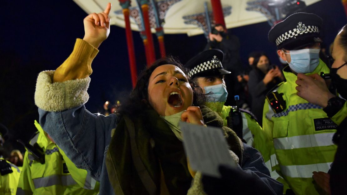 Dania Al-Obeid pictured among officers at the vigil. 