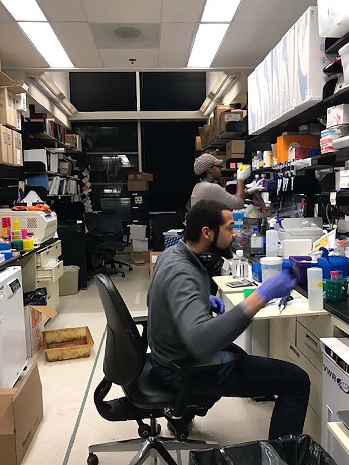Geoffrey Hutchinson working in the NIH lab on coronavirus vaccine research.