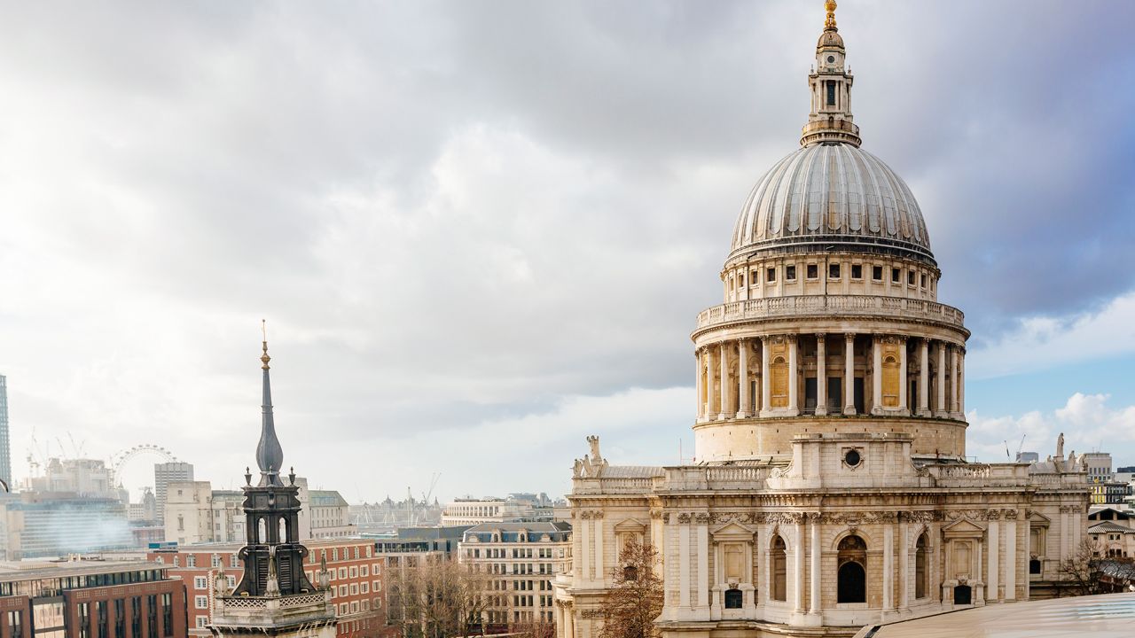 London skyline with dome of St Paul's cathedral on a cloudy day
