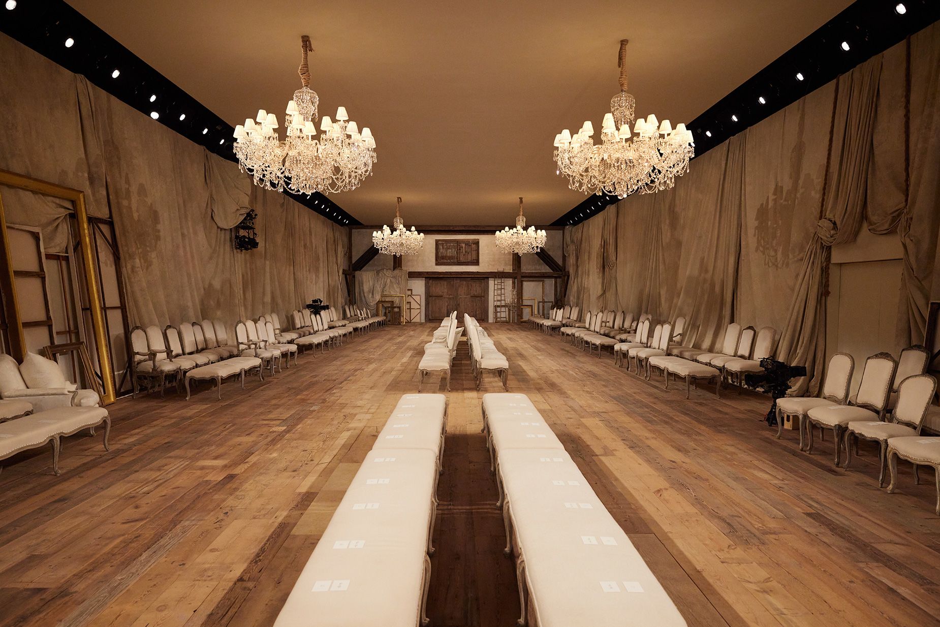 The show took place in "an unassuming utilitarian warehouse... transformed into a world of romance and rusticity," a Ralph Lauren press release read.