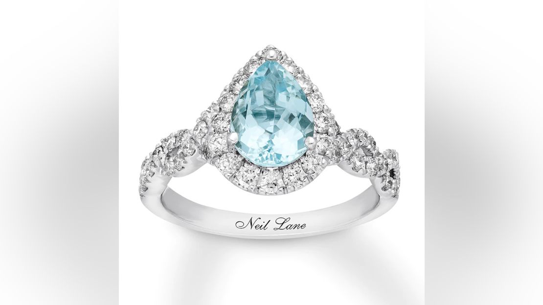 An aquamarine and diamond engagement ring in white gold from Kay Jewelers Neil Lane, priced at $3,399.99.