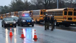 GREAT MILLS, MD - MARCH 20: School buses are lined up in front of Great Mills High School after a shooting on March 20, 2018 in Great Mills, Maryland. It was reported that two students at a Maryland high school were injured after a colleague opened fire in the hallway just before classes began. (Photo by Mark Wilson/Getty Images)